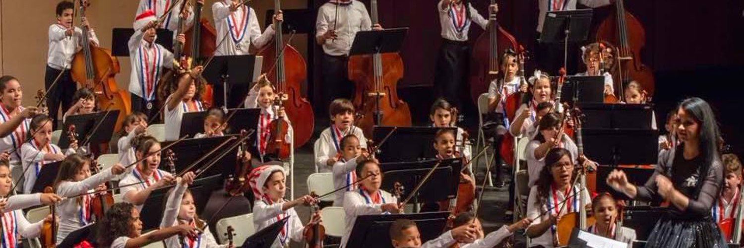 BMS Orchestra w/director, Rachel Pena